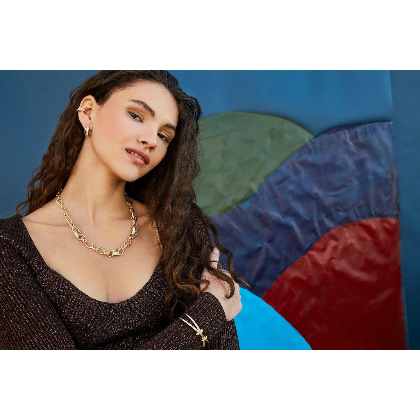 Livy Gold Huggie Earrings In White Crystal