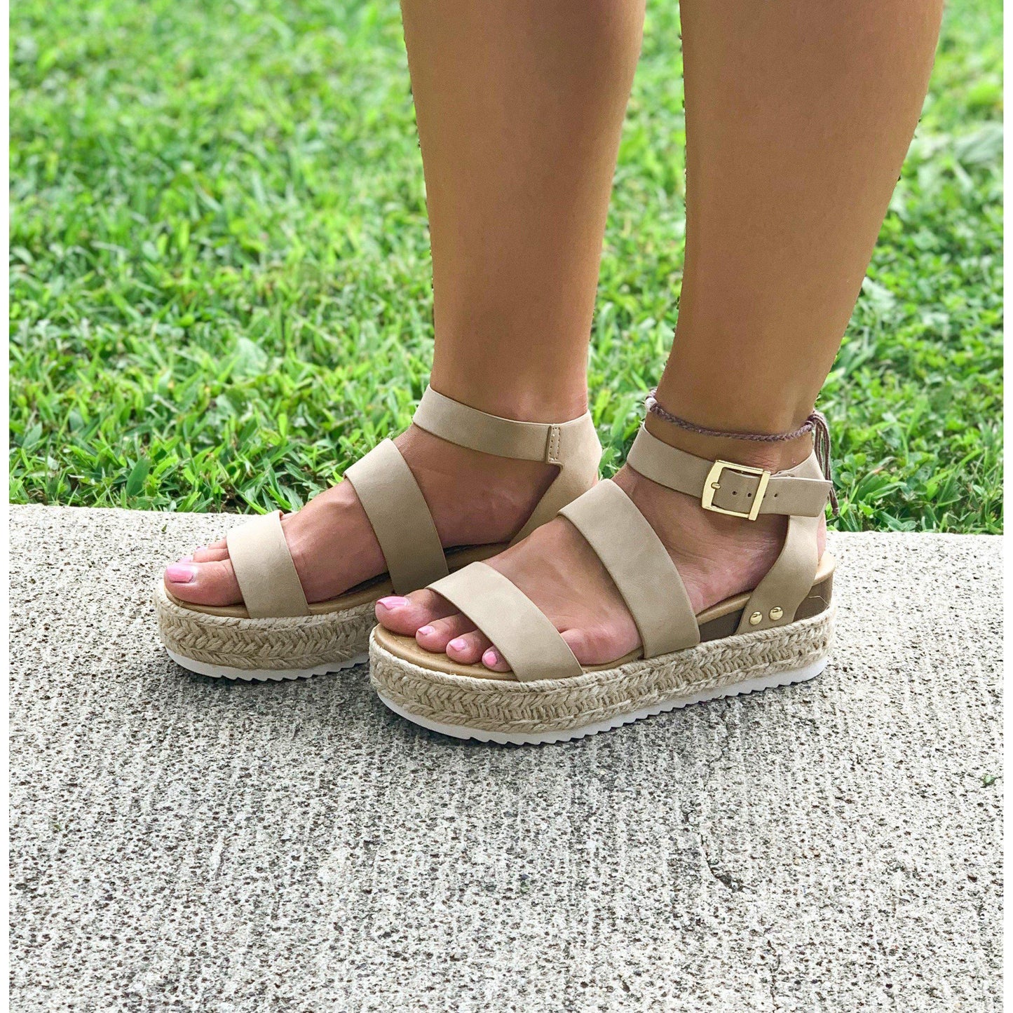 These shoes are the platform an espadrille style. The color taupe is very versatile.