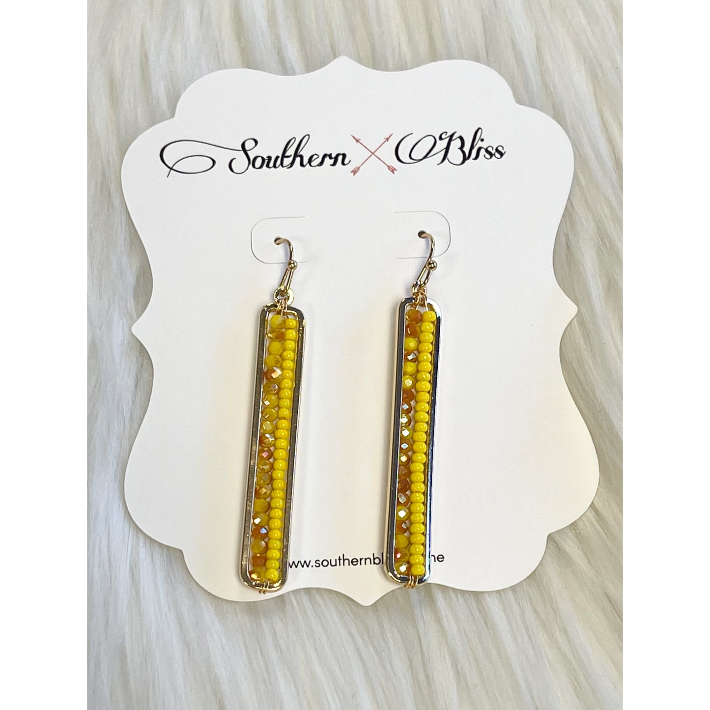 Long beaded earrings in yellow